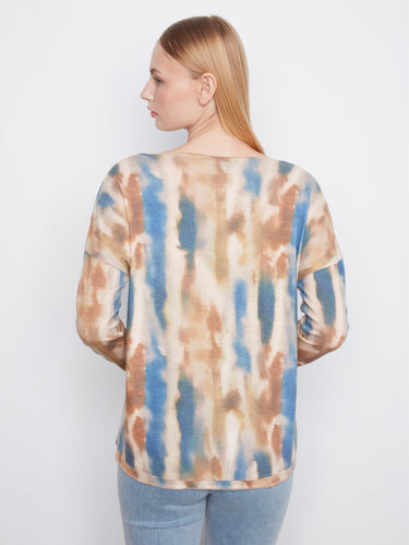 Abstract-patterned knit top with a relaxed fit and long sleeves, offering comfort and style for everyday wear by Charlie B.