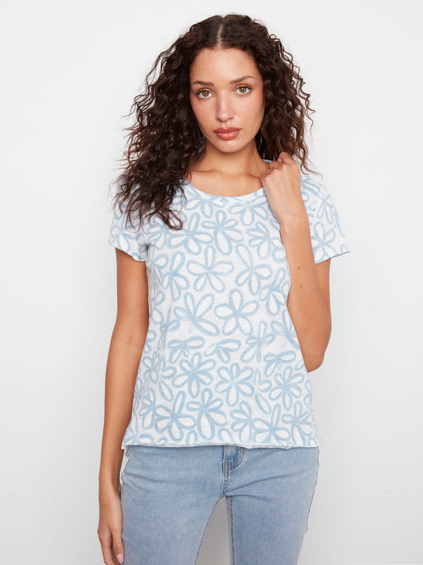 Floral-patterned top with a relaxed fit, perfect for casual outings. Made from 100% cotton for comfort and breathability by Charlie B.