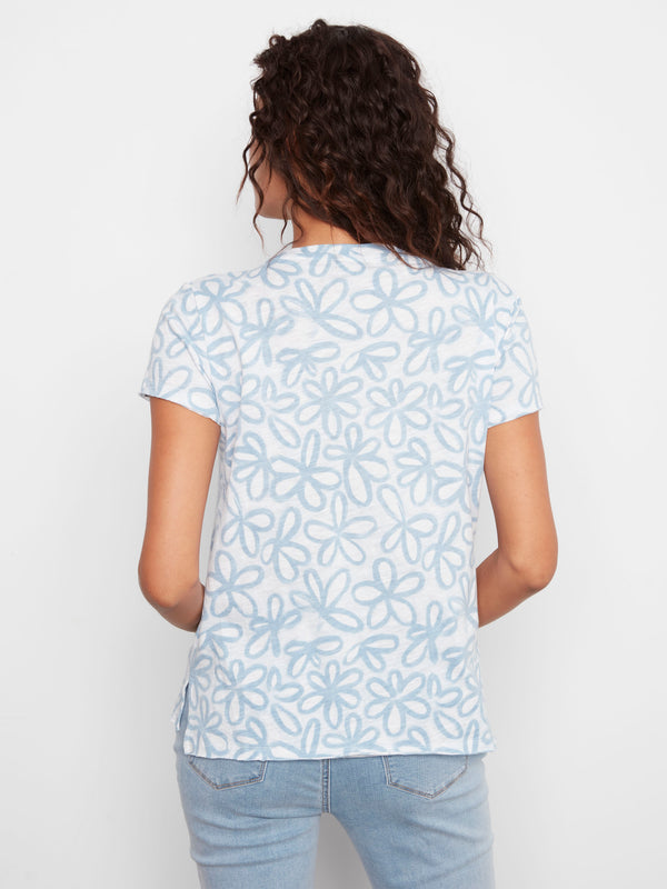 Embrace casual elegance with this floral design top featuring a crew neckline. Relaxed fit in pure cotton material by Charlie B.