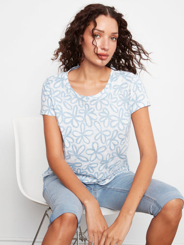 Stay cool in this charming flower print shirt made from 100% cotton, offering both style and relaxation effortlessly by Charlie B.