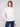 Ecru top featuring long sleeves and a fitted silhouette, perfect for layering or wearing alone by Charlie B.
