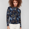Floral patterned top with a mock neck and slim fit, featuring exquisite ruffle detail at the hem by Charlie B.