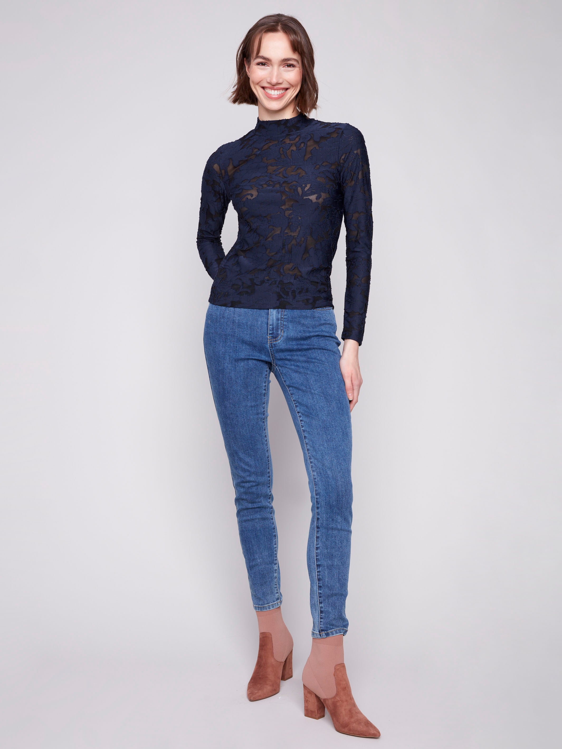Stylish mesh fabric top with long sleeves, offering both comfort and sophistication by Charlie B.