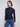 Chic mock neck design in blue black with detailed mesh for a modern flair by Charlie B.