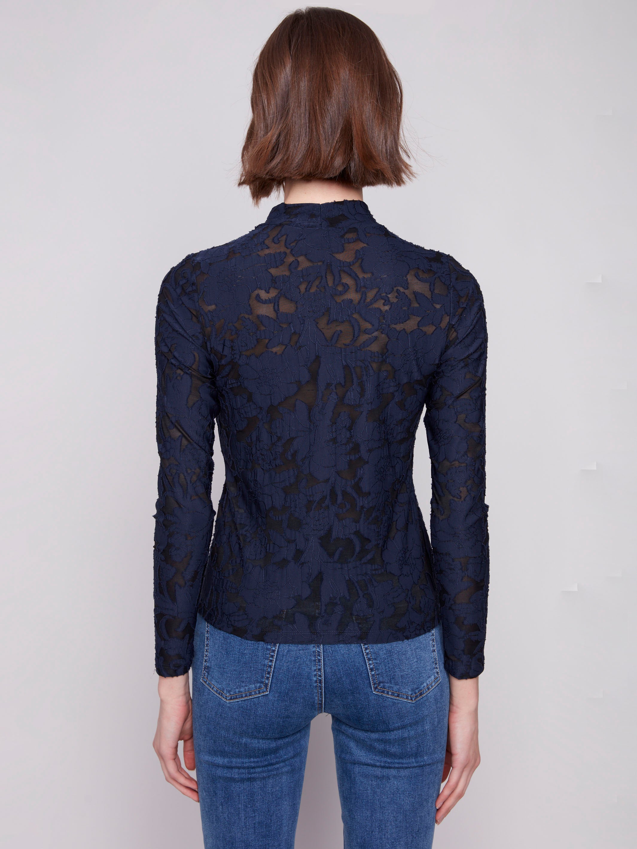 Sophisticated abstract burnout detailing adds texture to this versatile top by Charlie B.