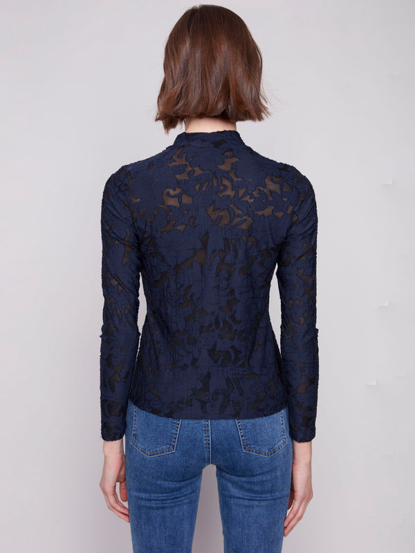 Sophisticated abstract burnout detailing adds texture to this versatile top by Charlie B.