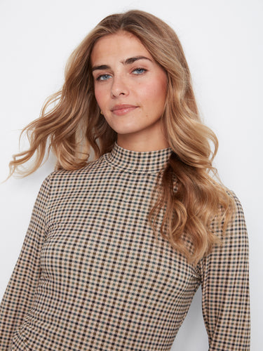 Soft stretch fabric in coffee plaid with a chic mock neckline and long sleeves by Charlie B.