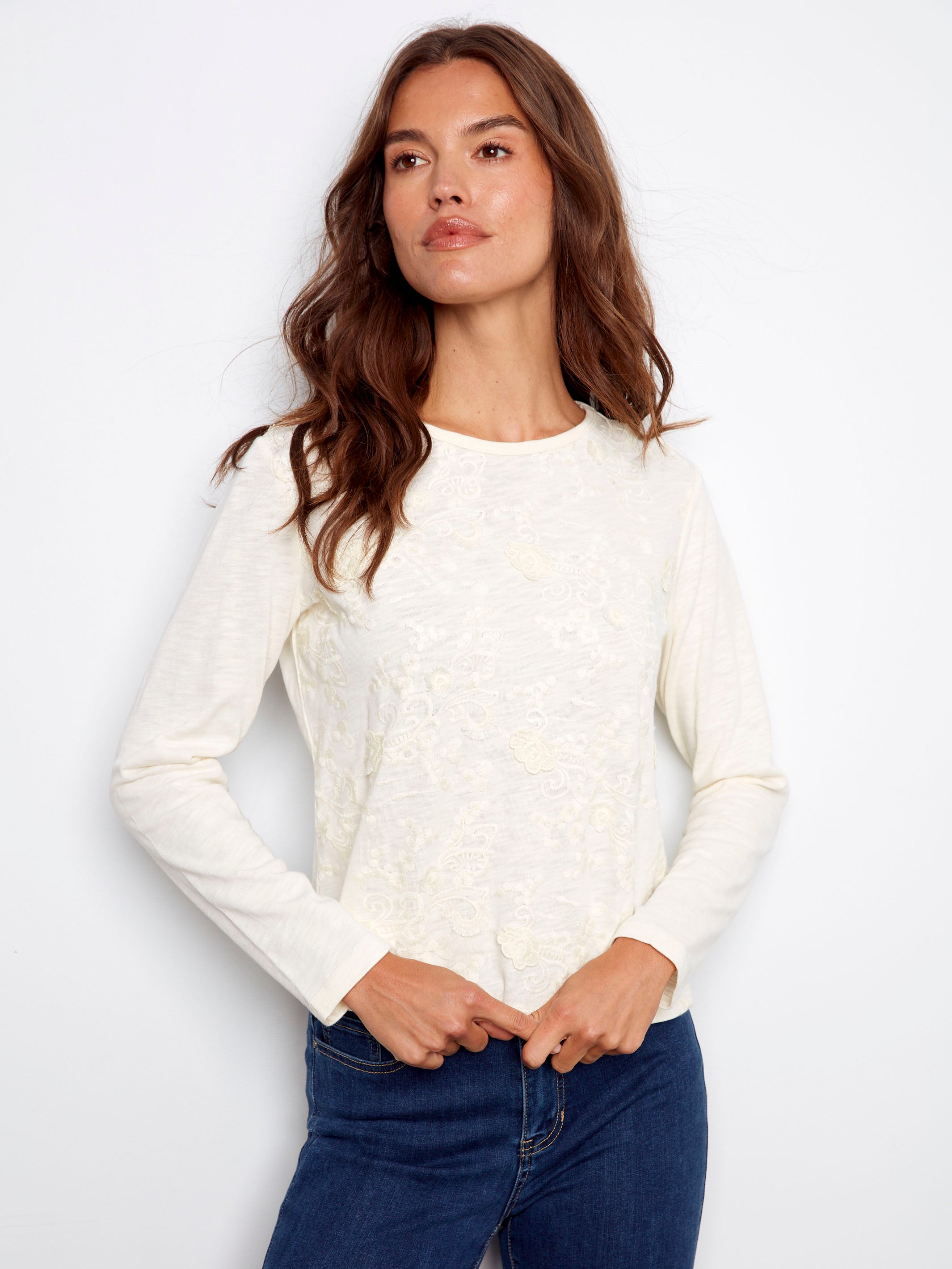 Ecru jersey top with floral embroidery detailing, crafted from 100% cotton for a soft touch by Charlie B.