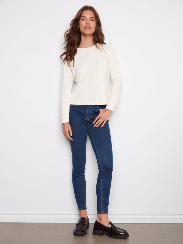 Stylish ecru long-sleeve jersey with intricate floral designs and comfortable fit by Charlie B.