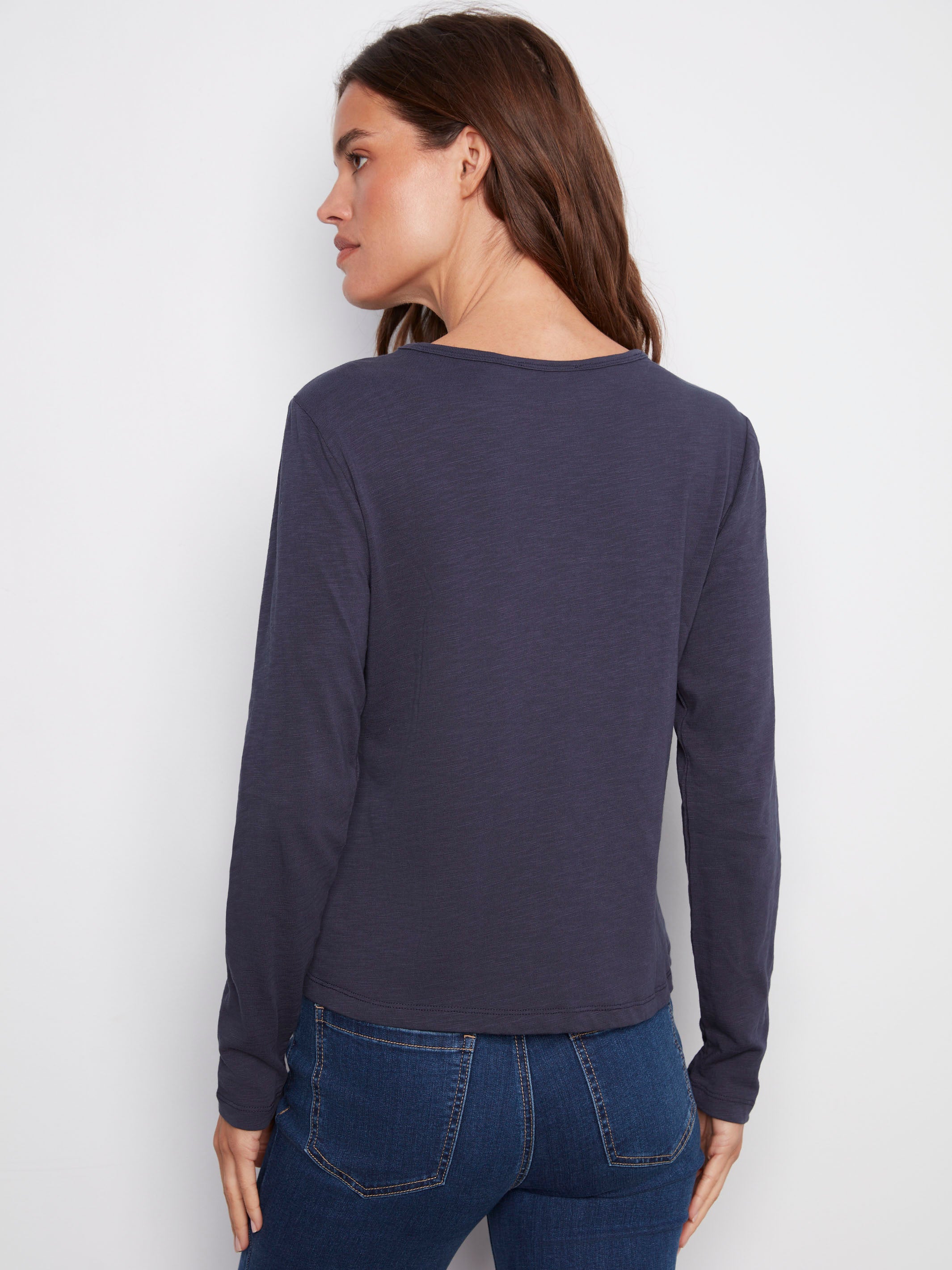 Stylish crew neckline enhances the comfort and elegance of this embroidered jersey top by Charlie B.
