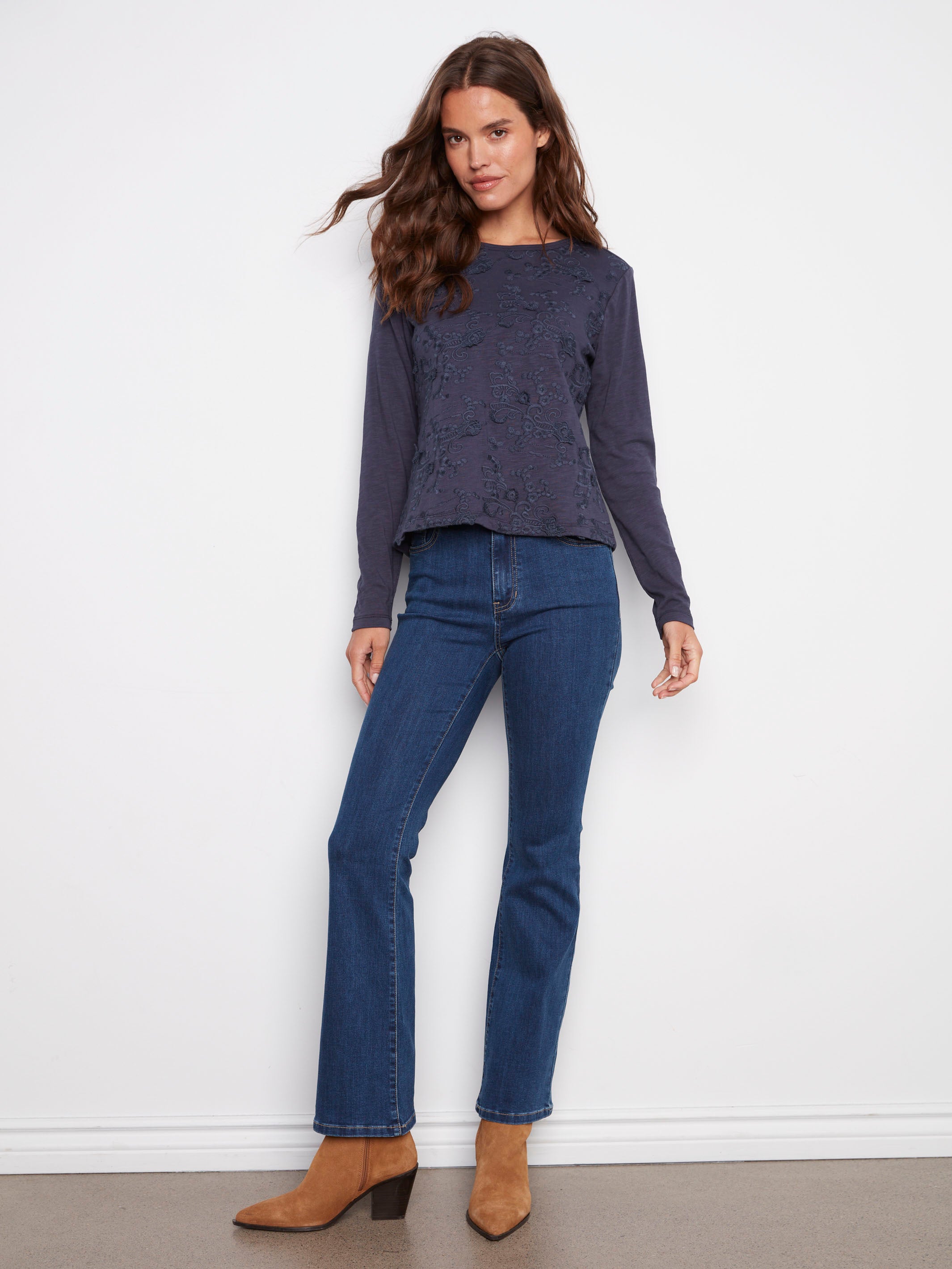 Chic moonlight top with long sleeves and exquisite floral detail, perfect for versatile styling by Charlie B.