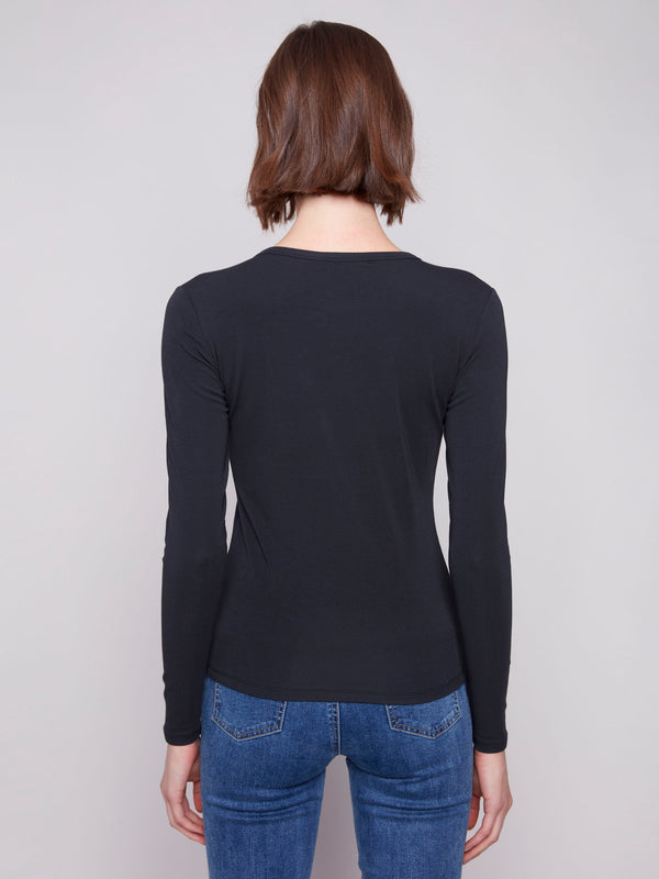Chic black cotton blend top showcasing a modern slim fit with comfortable long sleeves by Charlie B.