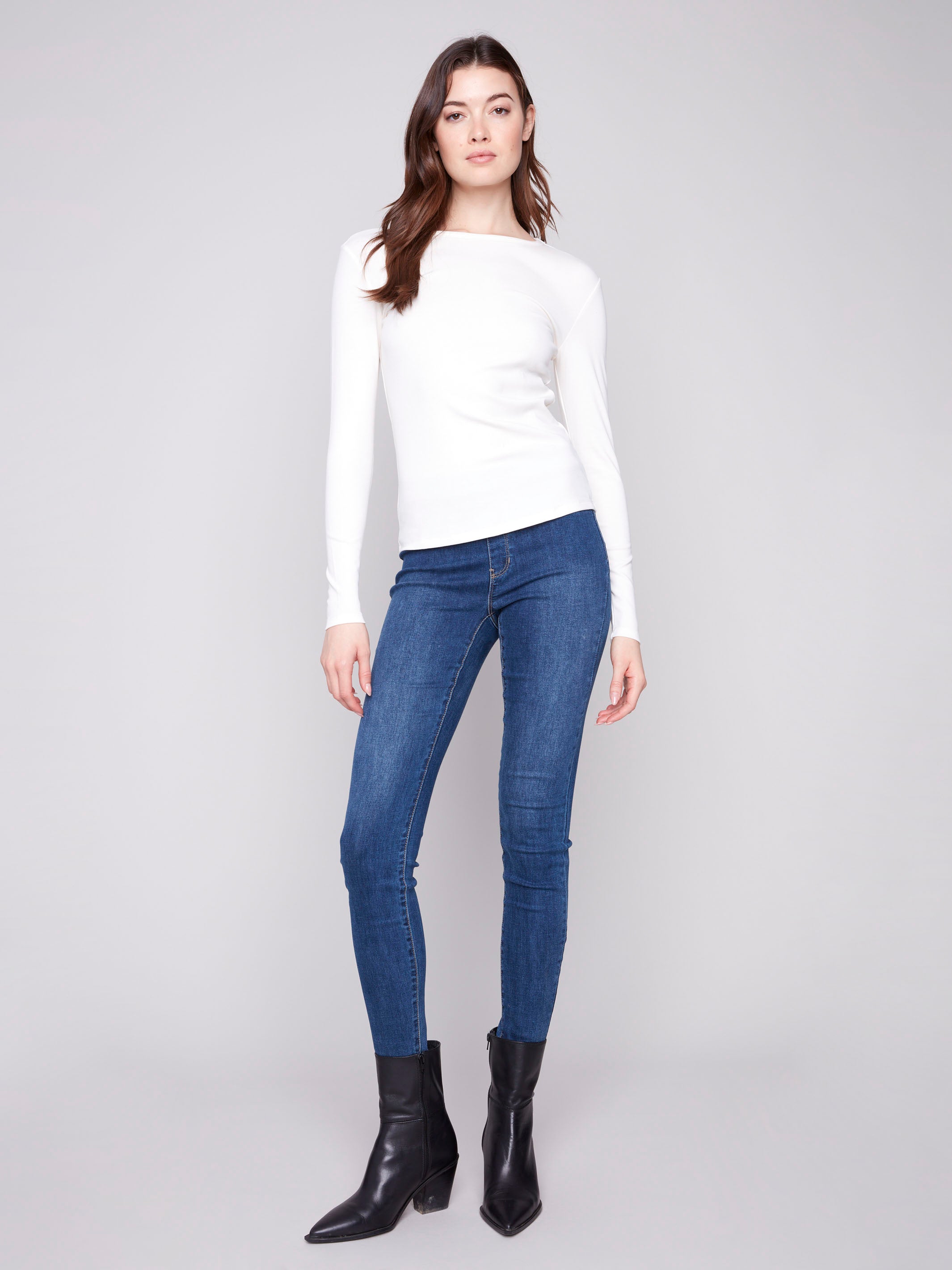 Stylish ecru top with a classic crew neckline, ideal for layering or wearing alone by Charlie B.