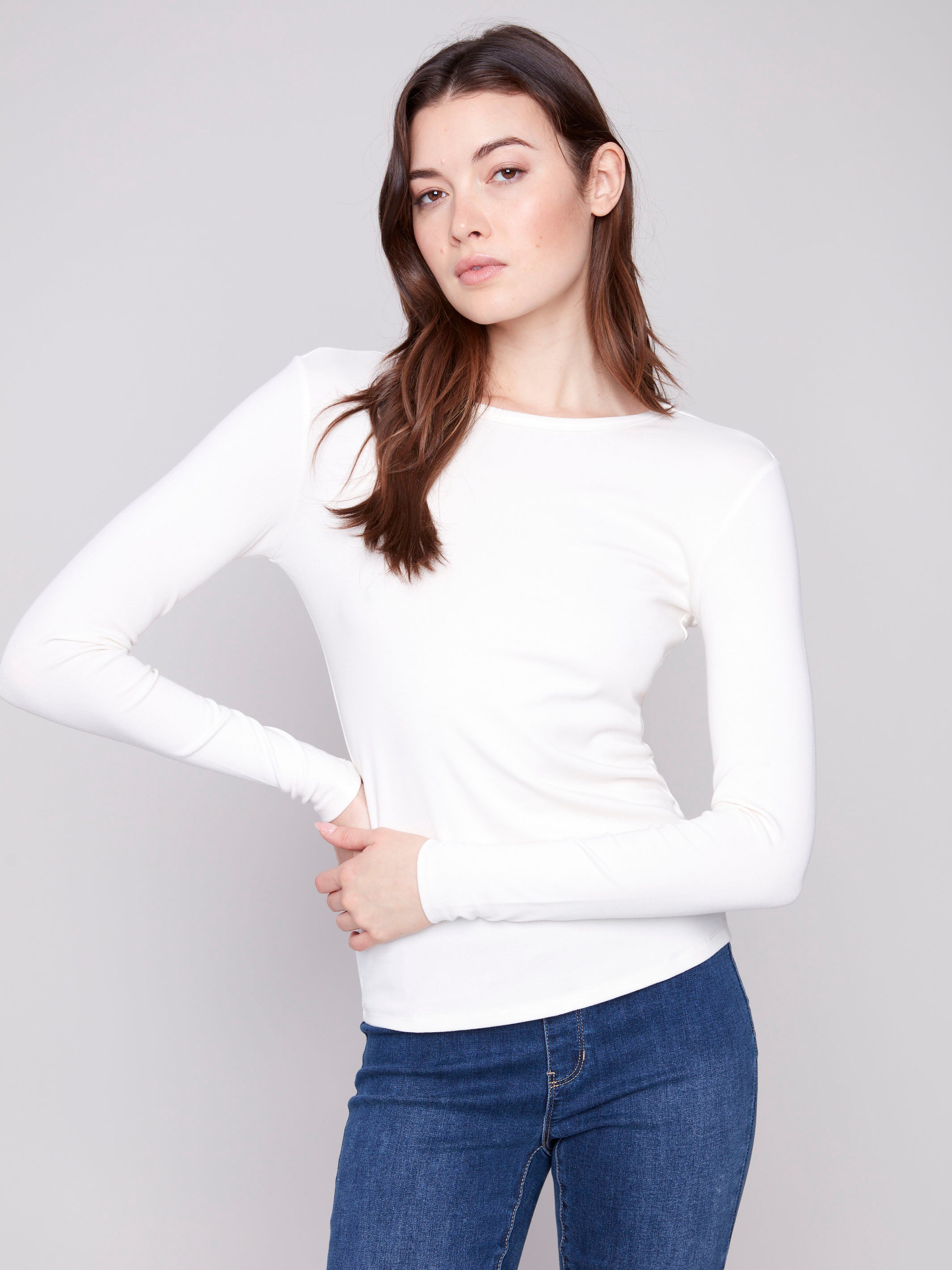 Long sleeve ecru knit top with a flattering slim fit, great addition to any wardrobe by Charlie B.