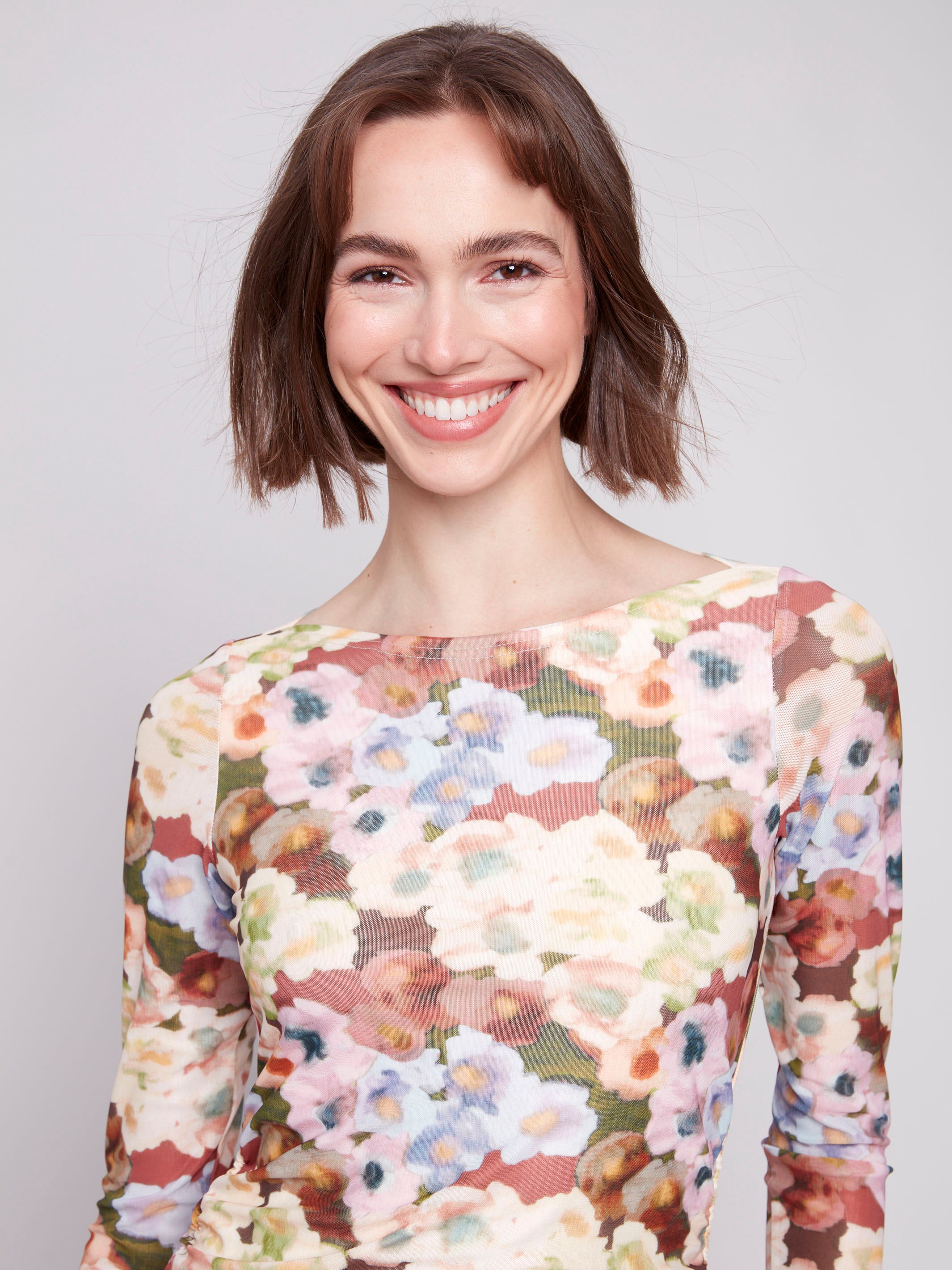 Elegant botanical print top featuring long sleeves and a stylish boatneck by Charlie B.
