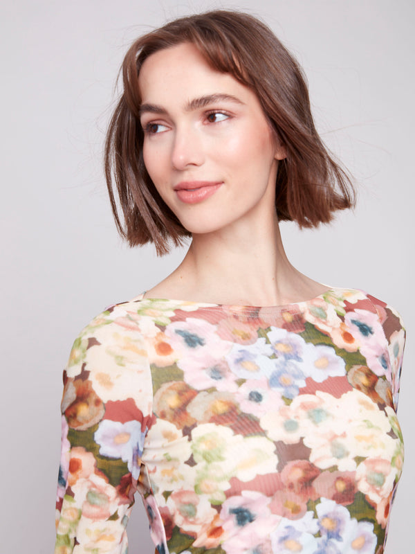 Botanical print top showcasing slim fit design for a modern touch by Charlie B.