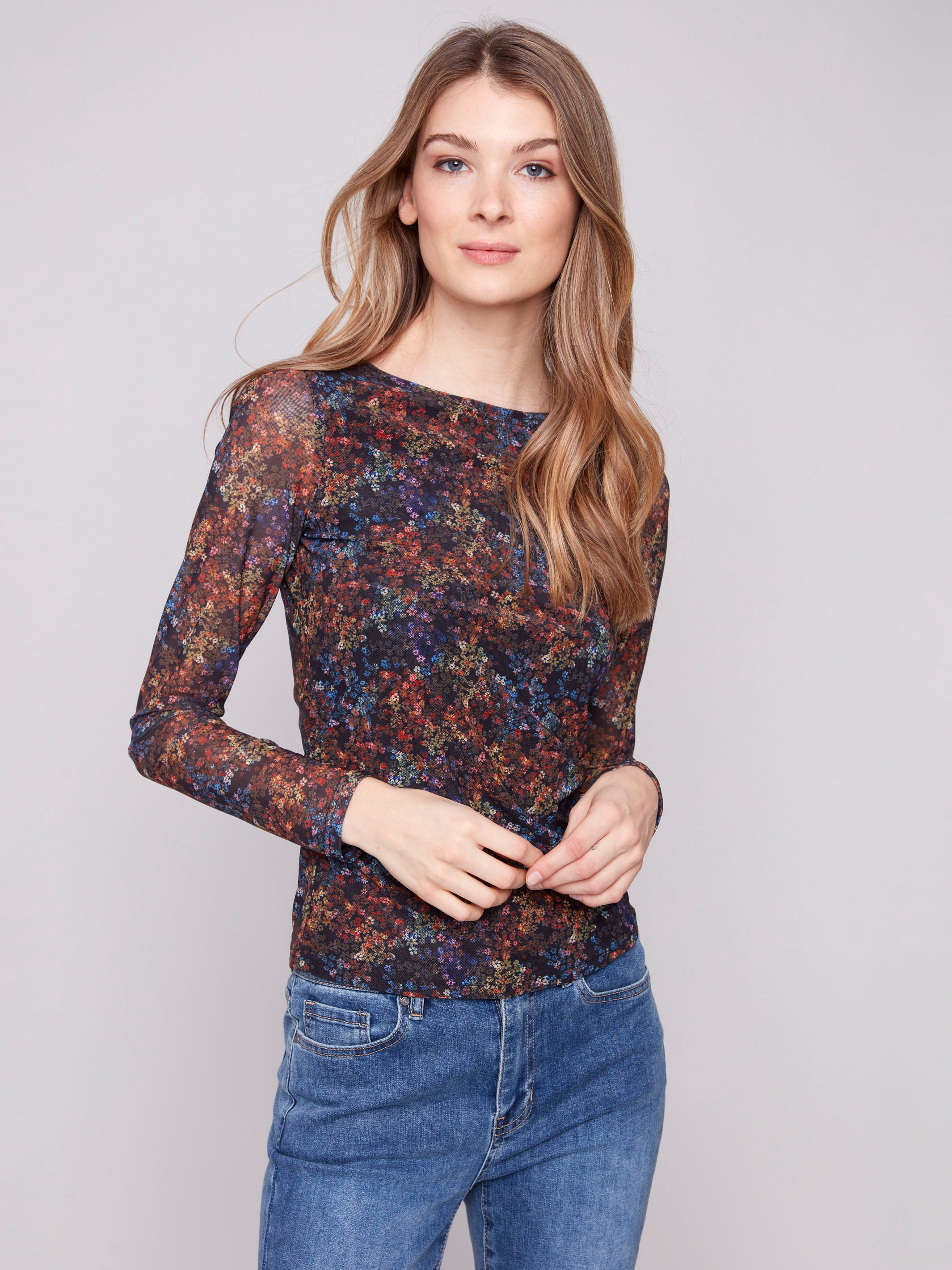Chic mesh top with floret print, offering a boatneck design and slim fit for an elegant silhouette by Charlie B.