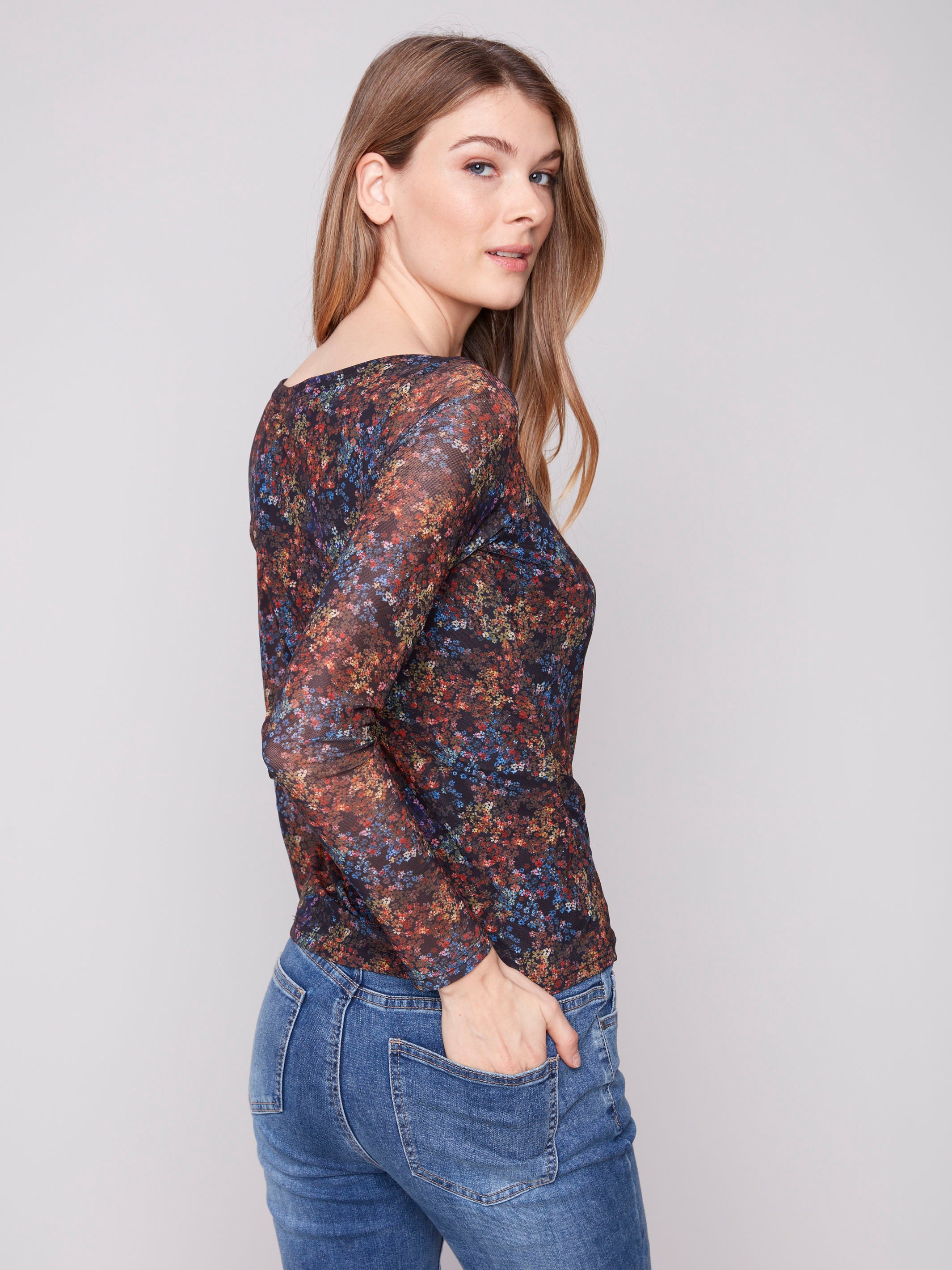 Stylish floret printed mesh top with lined front and back, adding sophistication to any outfit by Charlie B.