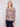 Astrology printed mesh top with slim fit, featuring a boat neckline and long sleeves for a chic look by Charlie B.