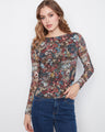 Floral pattern top with a boat neckline, featuring long sleeves for a stylish look by Charlie B.