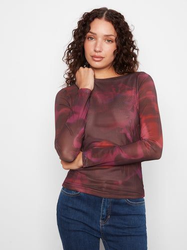 With long sleeves, this slim-fit top provides comfort and style for any casual outing or formal event. By Charlie B.