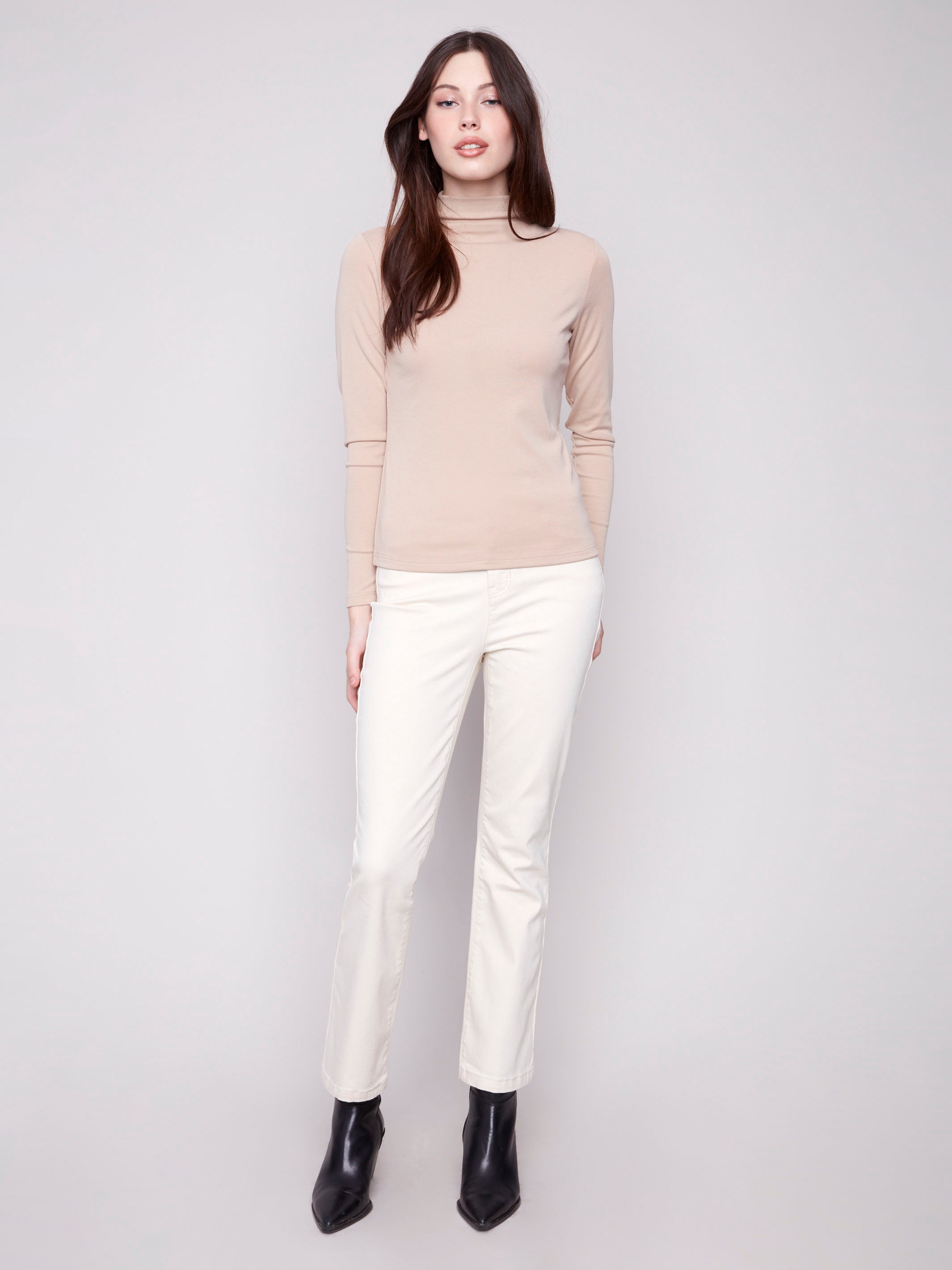 Elegant sesame mock neck top with a comfortable slim fit design by Charlie B.