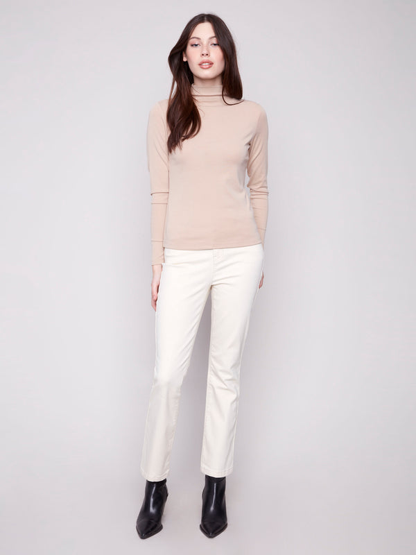 Elegant sesame mock neck top with a comfortable slim fit design by Charlie B.