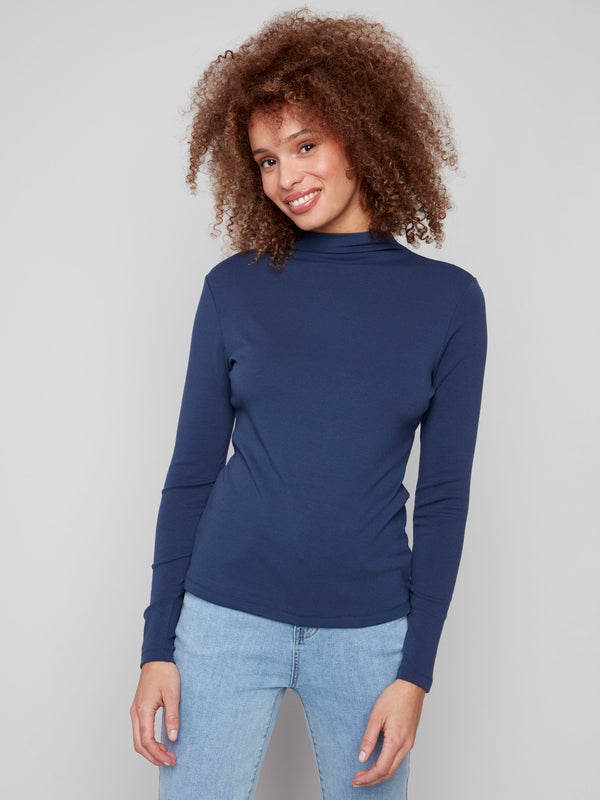 Chic long-sleeve top in moonlight blue with a fine ribbed texture, offering comfort and style by Charlie B.