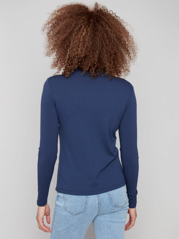 Stylish moonlight blue mock neck top with an impeccable slim fit that enhances your figure by Charlie B.