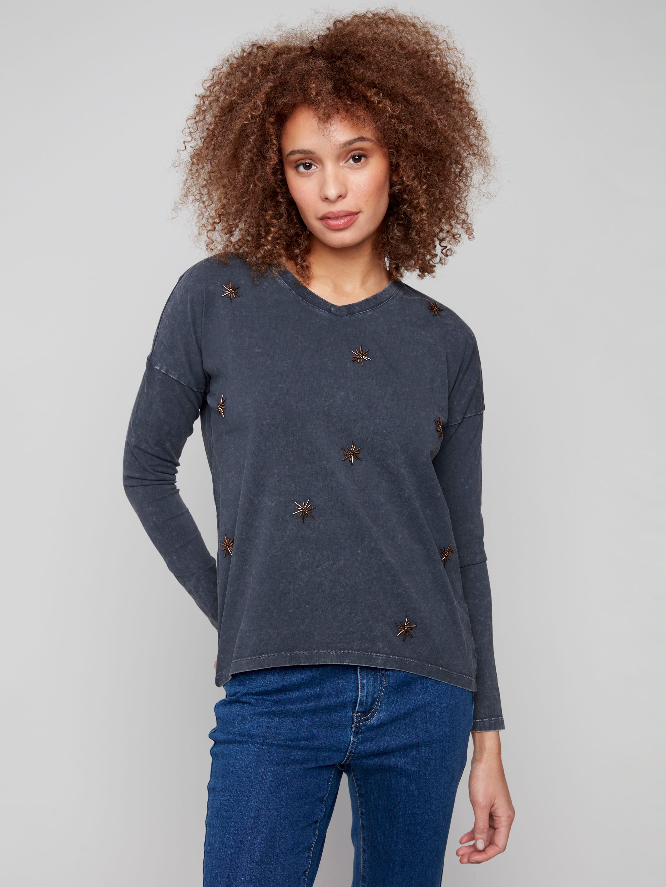 Charcoal top with long dolman sleeves featuring intricate beaded accents, offering a touch of elegance by Charlie B.