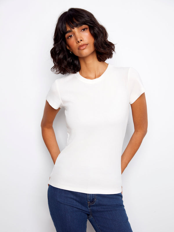 White T-shirt with a classic crew neck, featuring a semi-fitted style for versatile wear by Charlie B.
