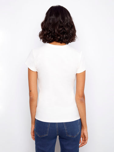 Semi-fitted white T-shirt with short sleeves, perfect for layering or wearing alone by Charlie B.