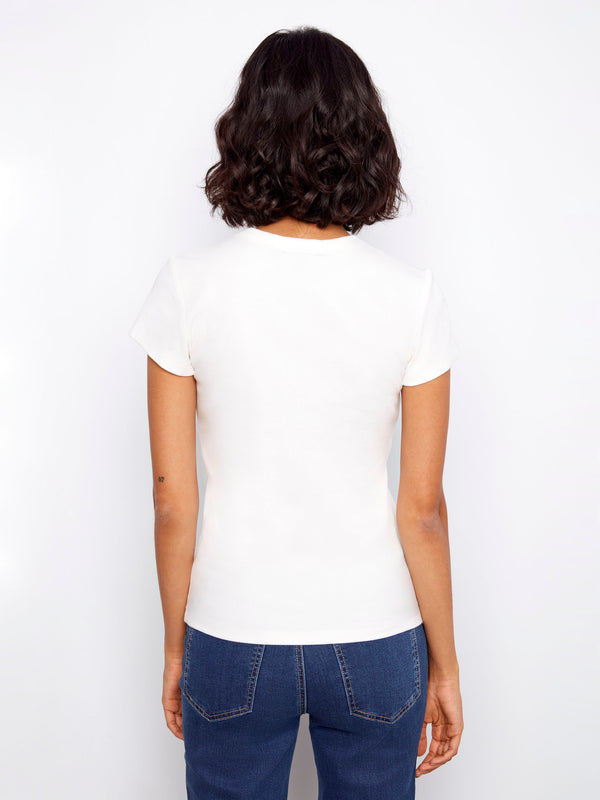 Semi-fitted white T-shirt with short sleeves, perfect for layering or wearing alone by Charlie B.