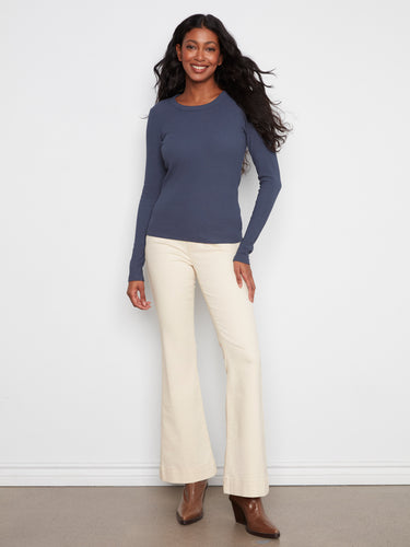 Midnight blue top featuring long sleeves and a ribbed texture, made from a soft cotton blend by Charlie B.