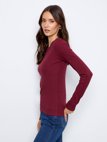 Crafted with a ribbed texture, this versatile top adds dimension to any outfit while maintaining a sleek silhouette by Charlie B.