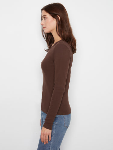 The ribbed texture adds an elegant touch to this stylish piece, ensuring you stand out effortlessly. Designed by Charlie B.