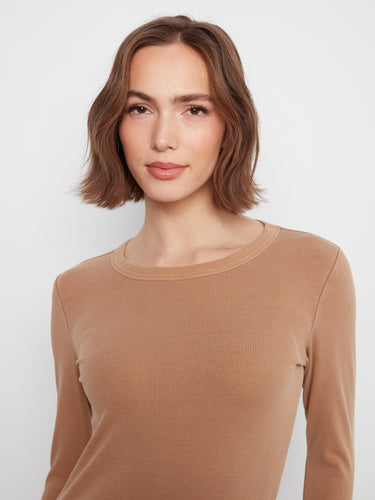 Classic slim fit top with a crew neckline, offering comfort with its stretch cotton-tencel blend fabric. By Charlie B.