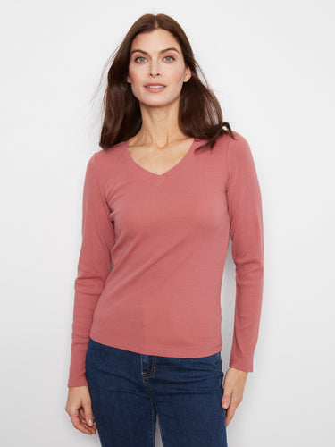 This top features a flattering V neckline, perfect for any occasion. Crafted with care and style by Charlie B.