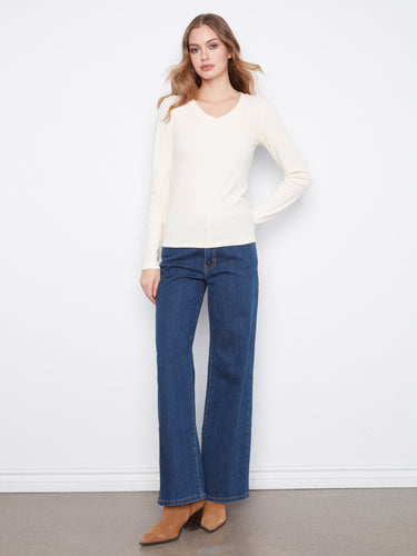 Long sleeves provide warmth and elegance to this slim fit top, made from a comfortable stretch cotton-tencel blend by Charlie B.