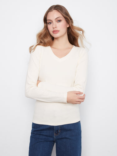 The ribbed texture adds sophistication and style to this soft, slim fit top crafted from premium materials by Charlie B.