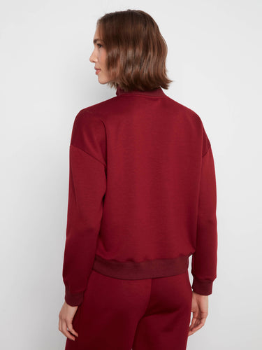 Relaxed fit merlot sweatshirt with ribbed details at the cuffs and hem for added texture by Charlie B.