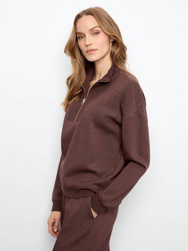 Long sleeves enhance the comfort and style of this piece, making it ideal for any casual occasion. By Charlie B.
