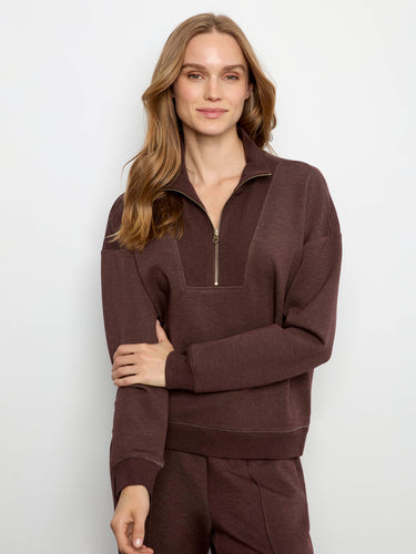 Made from soft scuba fabric, this outfit ensures a cozy feel while maintaining its chic look. By Charlie B.
