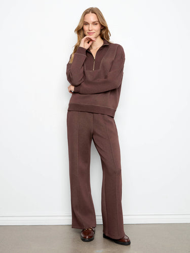 Ribbed cuffs and hem provide subtle texture to the overall smooth finish of this fashion-forward piece by Charlie B.