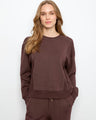Espresso sweatshirt featuring ribbed side panels and a relaxed fit by Charlie B.