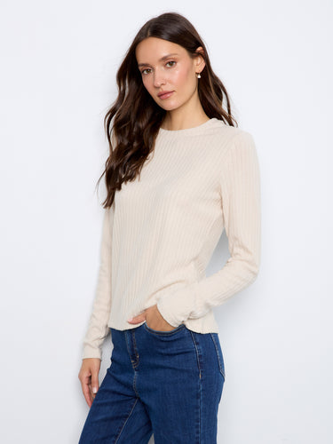 Cozy sweater with a brushed ribbed texture adds warmth to your wardrobe essentials. By Charlie B.