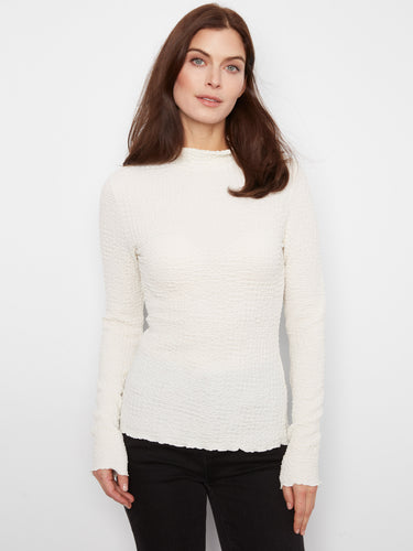 Elegant top featuring a mock neck design, perfect for a sophisticated look. Crafted with attention to detail by Charlie B.