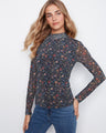 Floral top featuring a mock neckline, offering a chic and sophisticated look by Charlie B.