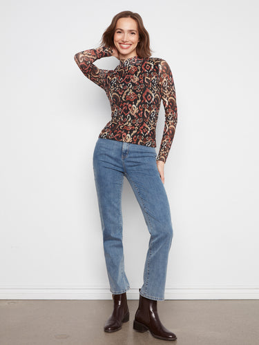 With its long sleeves, this patterned top ensures both style and comfort throughout your day. By Charlie B.