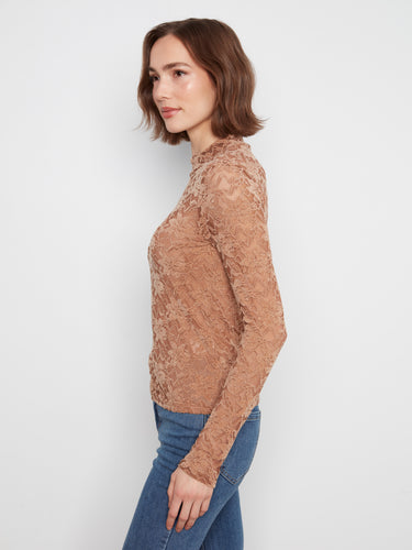 Flocked lace adds texture to this chic mock neck top, combining classic style with modern flair. By Charlie B.